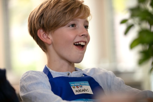 Junge lacht am Projekttag Mehr bewegen - besser essen EDEKA Stiftung